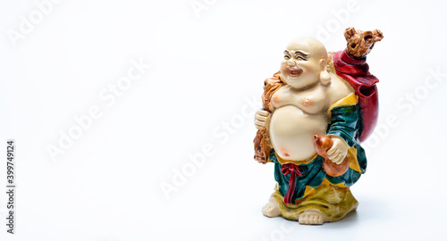 Happy Laughing Buddha or happy buddha comes with happiness and smiles on white background.
