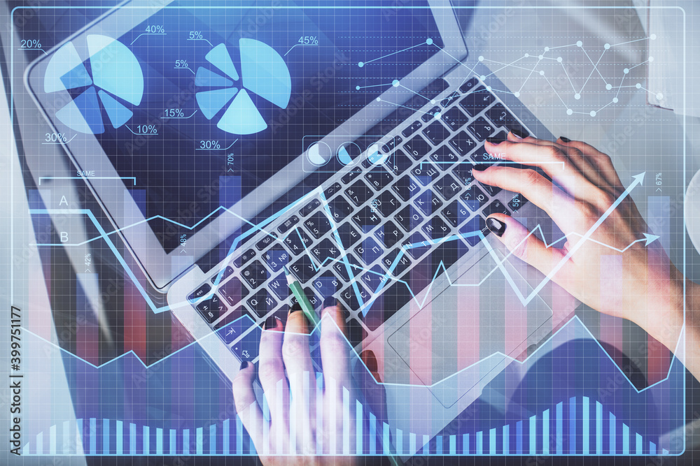 Double exposure of woman hands working on computer and forex chart hologram drawing. Top View. Financial analysis concept. Double exposure of woman hands working on computer and forex chart hologram drawing. Top View. Financial analysis concept.