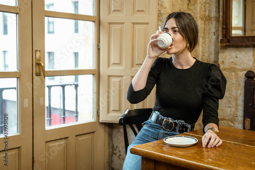 girl in a coffee shop smiling