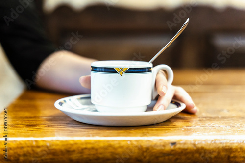 girl in a coffee shop smiling