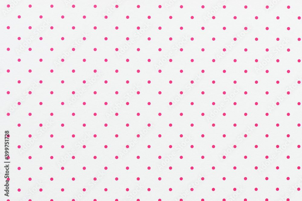 White sheet of paper with pink polka dots. For use as a background or texture. - obrazy, fototapety, plakaty 