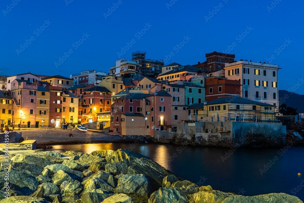 Night view of the ancient fishing village, located a few minutes from the center of Genoa, Ligurian sea, Italy.