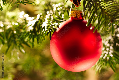 close up of a red christmas tree ball