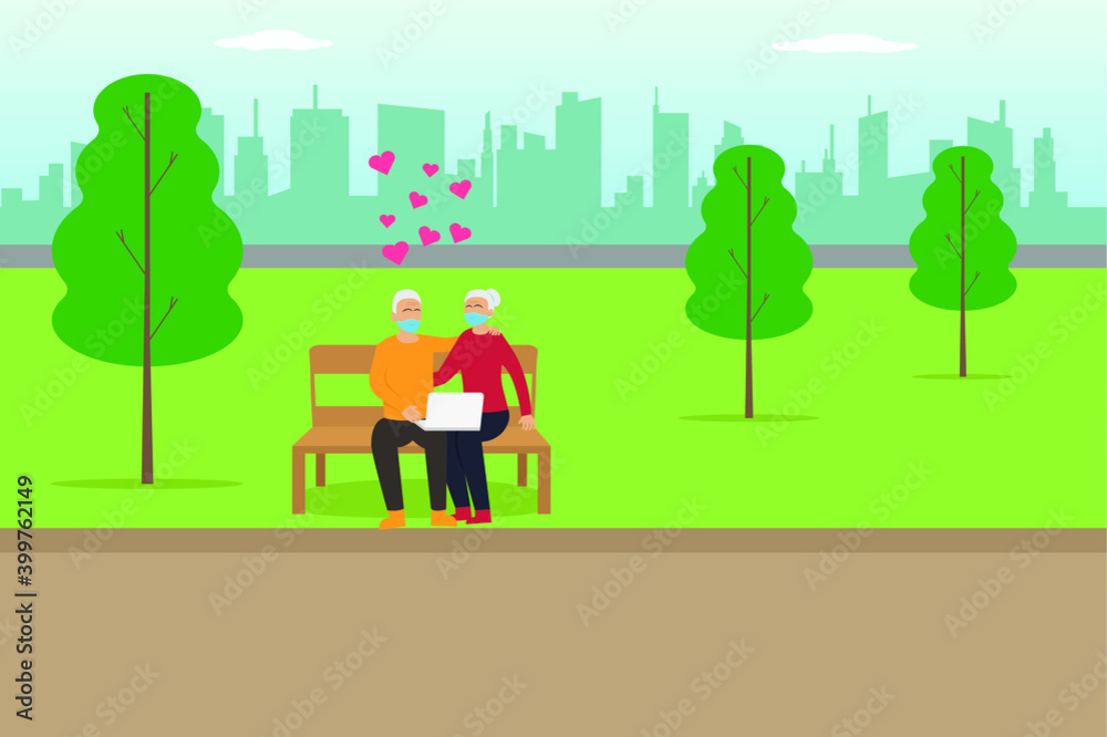 Happy gray hair senior couple wearing face mask and sitting on the bench at the park while using laptop computer with heart symbol Happy gray hair senior couple wearing face mask and sitting on the bench at the park while using laptop computer with heart symbol