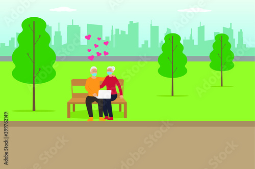 Happy gray hair senior couple wearing face mask and sitting on the bench at the park while using laptop computer with heart symbol