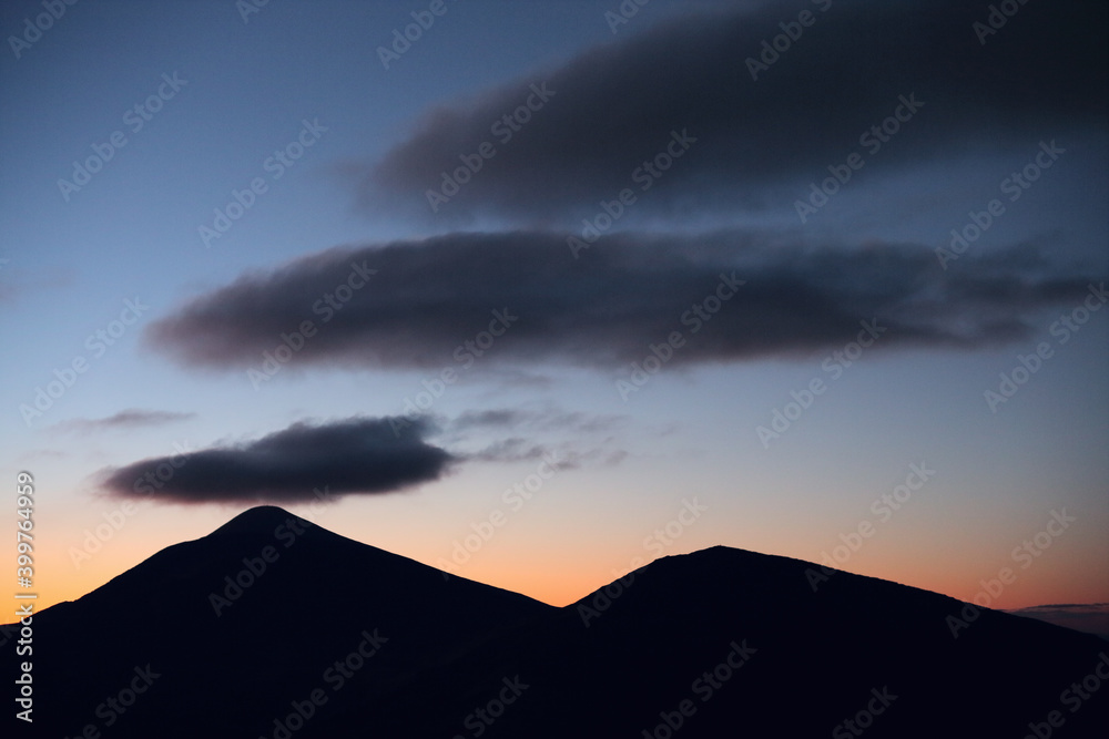 Beautiful sunset from the tops of the mountains of the Carpathians in spring.