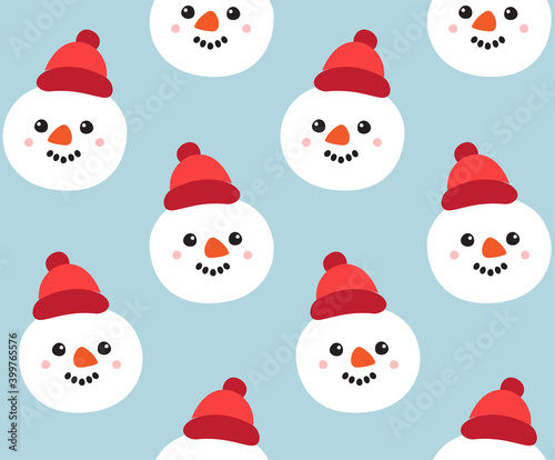Vector seamless pattern of hand drawn doodle flat snowman face isolated on blue background