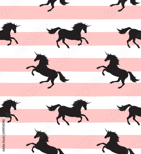 Vector seamless pattern of black unicorn silhouette isolated on pink striped background