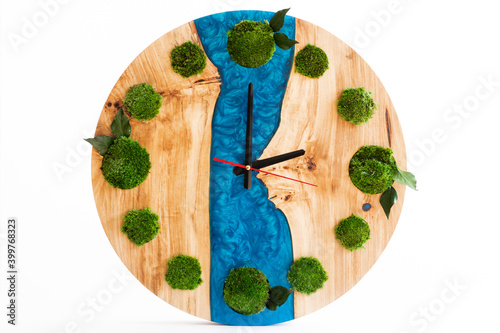 Clock made of natural wood and epoxy with sterilized moss of different colors. Handmade