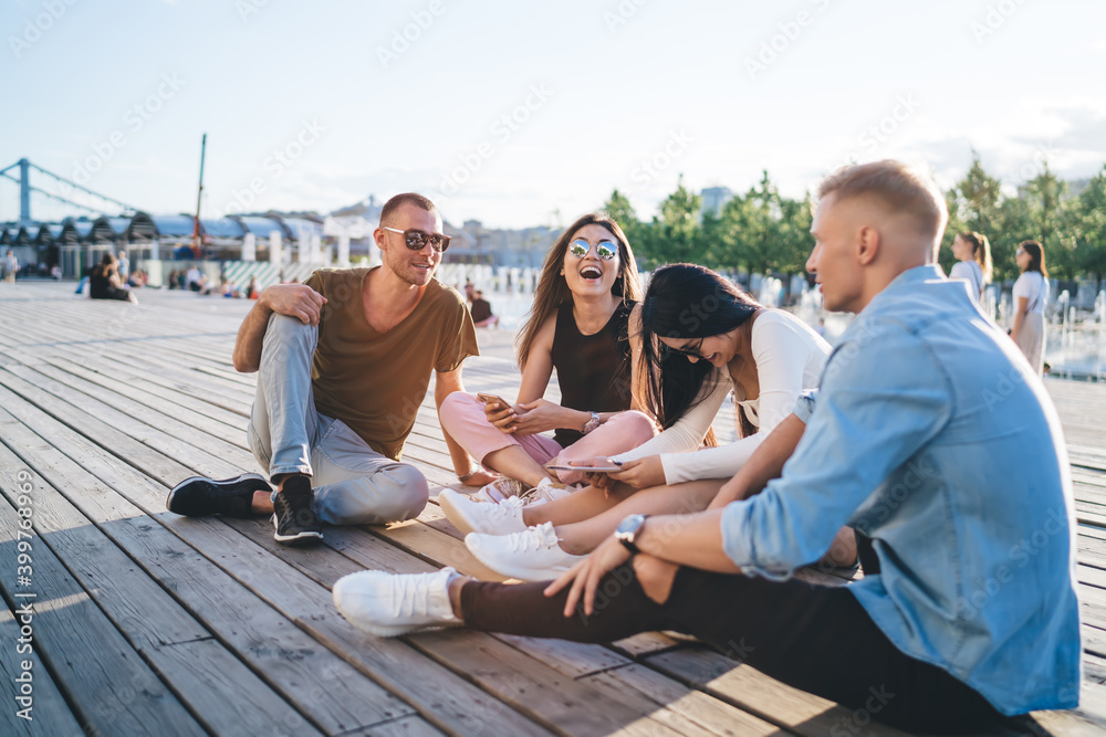 Cheerful people having fun in park Cheerful people having fun in park
