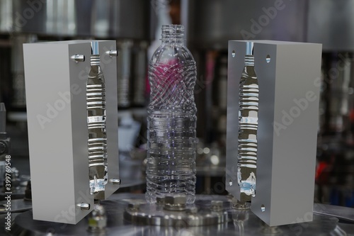 Mould of PET plastic bottles drinking water container on bottle blowing machine background