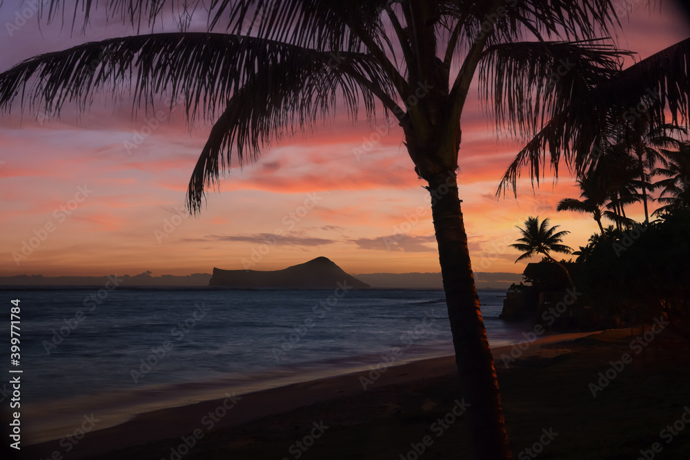 sunset in hawaiian beach with red sky