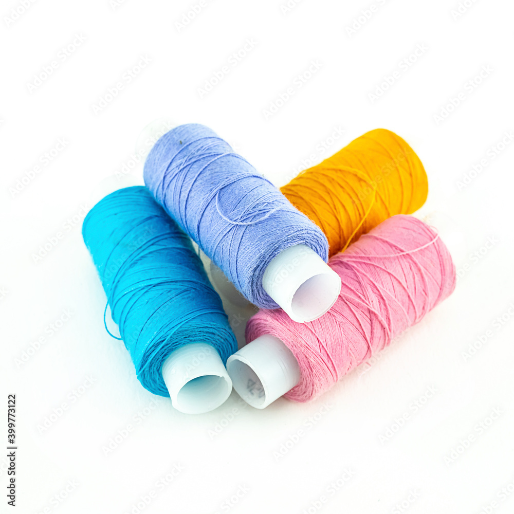 set material for a hobby embroidery pink, blue and yellow on a white background set material for a hobby embroidery pink, blue and yellow on a white background