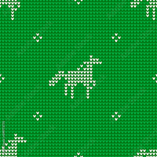 Seamless knitting pattern with horses is on the green background. Save with the Clipping Mask.