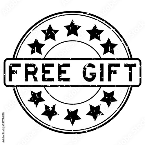 Grunge black free gift word with star icon round rubber seal stamp on white background