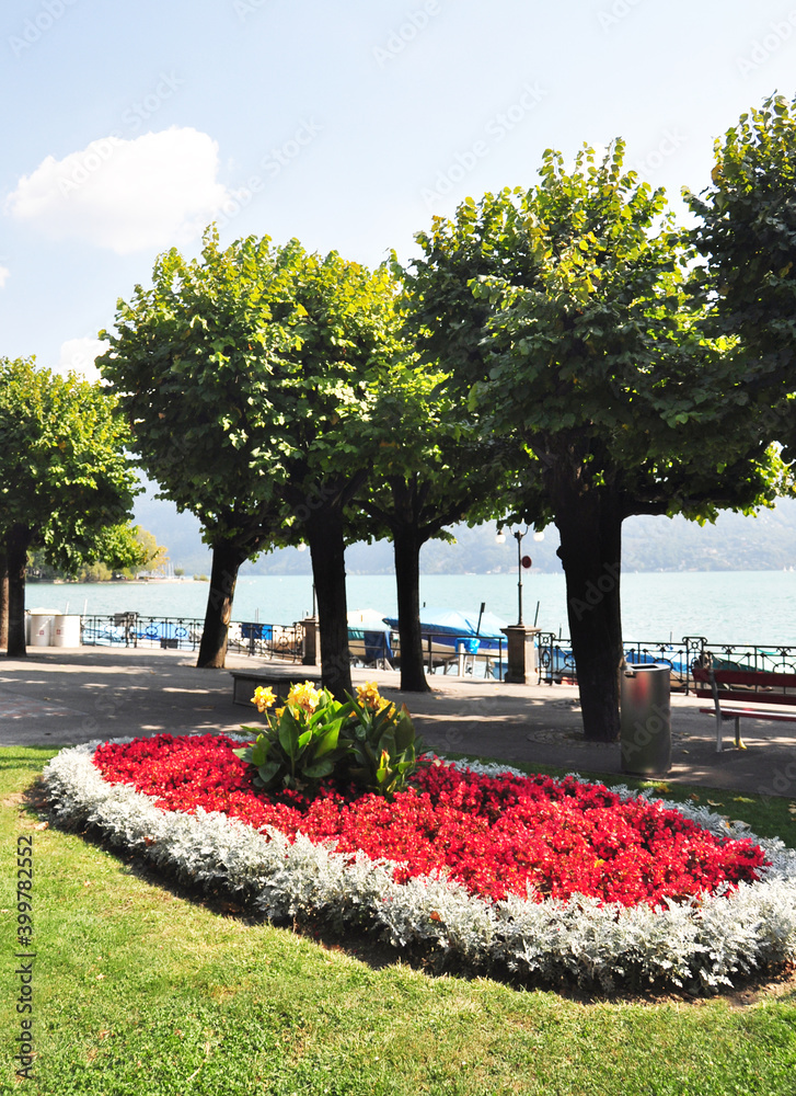 The lakeside of Lucerne has excellent and garden like landscaping. The photo views one such area near a tourist boat area on the lake.