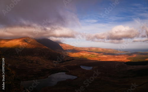 sunset over the mountains and Atlantic ocean