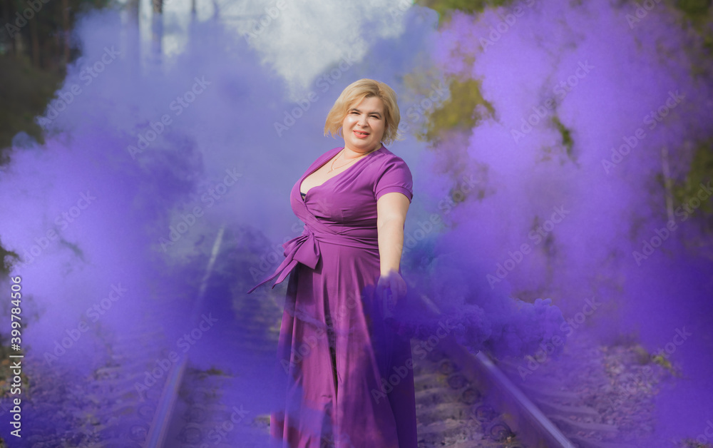 Nice plump lady portrait, lifestyle elegant woman, American chubby woman with a colorful bomb having fun outdoor Nice plump lady portrait, lifestyle elegant woman, American chubby woman with a colorful bomb having fun outdoor