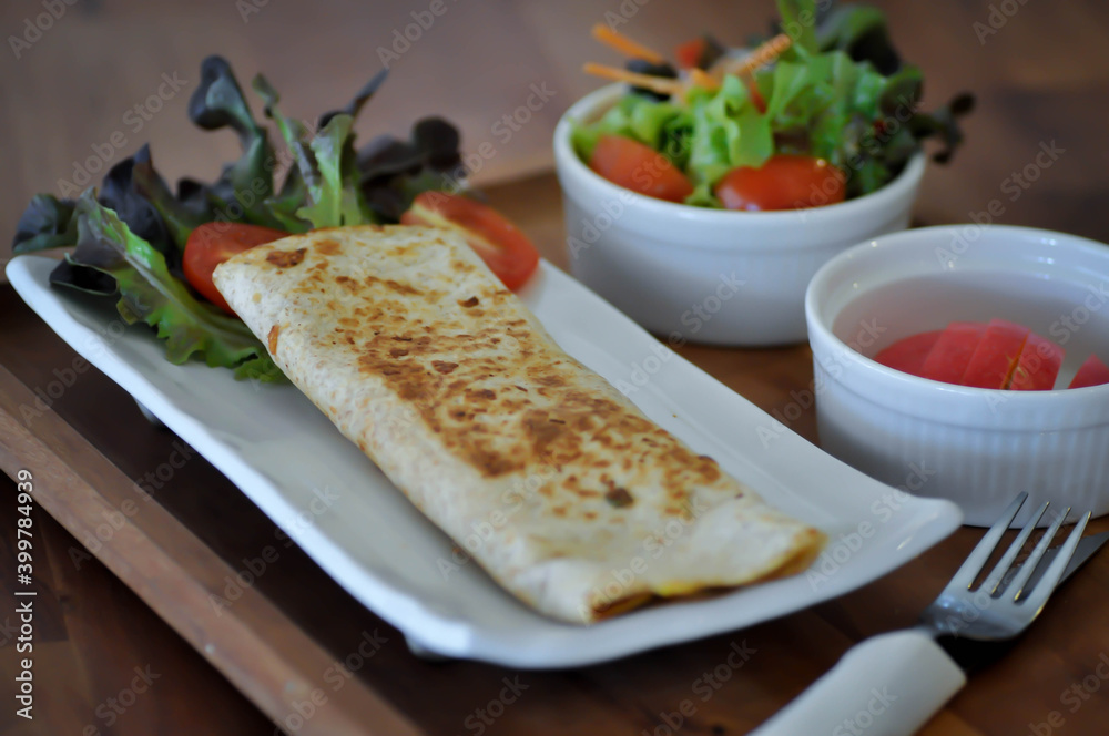 taco ,vegetable roll or salad roll or burrito or tortilla taco ,vegetable roll or salad roll or burrito or tortilla