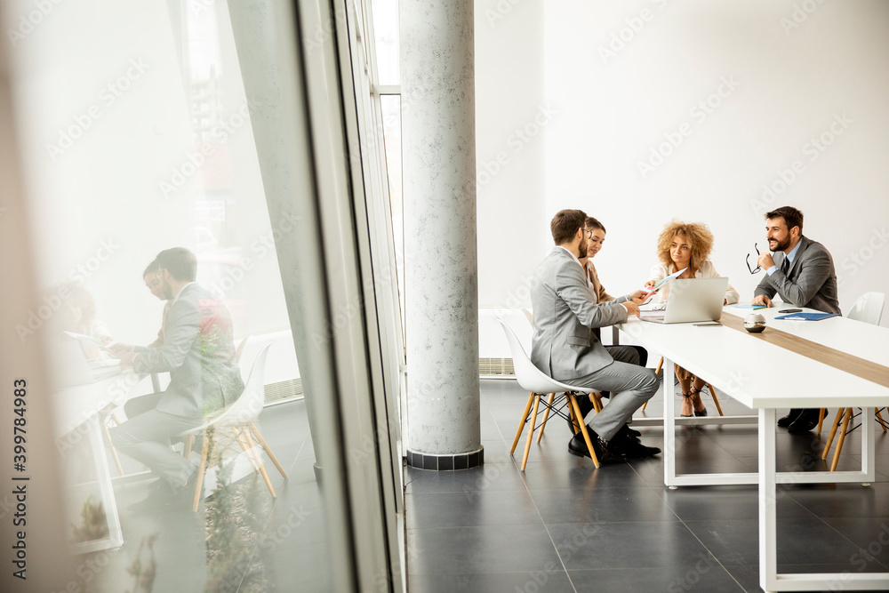 Multiethnic business people working together in the office Multiethnic business people working together in the office