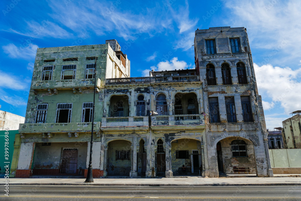 Cuba: Old ruined houses along the Malecon in Havana