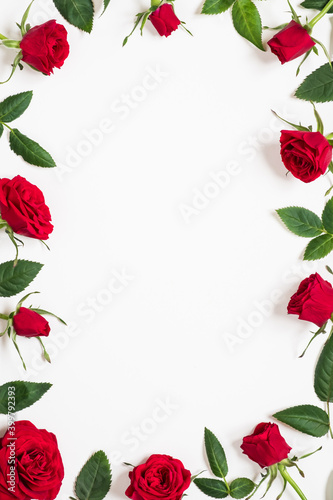 Valentine's day, love, romantic concept. Red roses on white background. Flat lay, top view, copy space