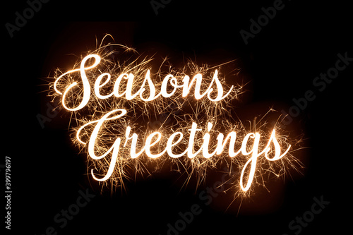 Seasons Greetings in dazzling sparkler effect on black background
