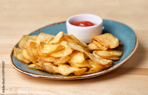 potato chips on plate - unhealthy food. Menu for beer in restaurant