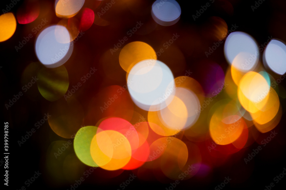Christmas lights colorful bokeh background. Holiday festive atmosphere Christmas lights colorful bokeh background. Holiday festive atmosphere