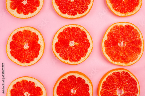 top view tasty grapefruits lined on pink background juice fresh fruit color citrus diet