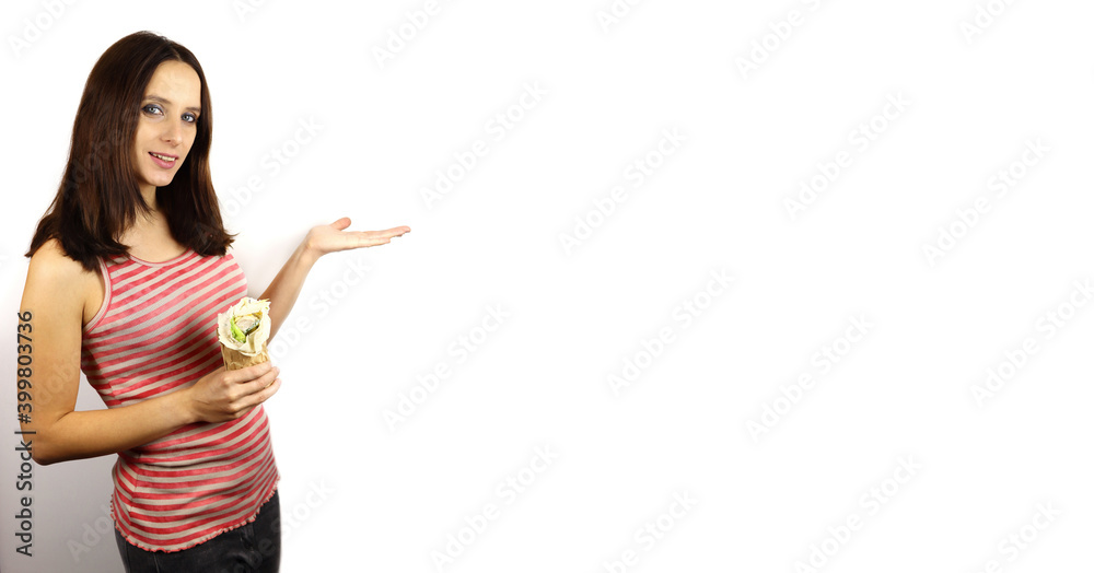 attractive girl holding hotdog in pita bread. horizontal banner attractive girl holding hotdog in pita bread. horizontal banner
