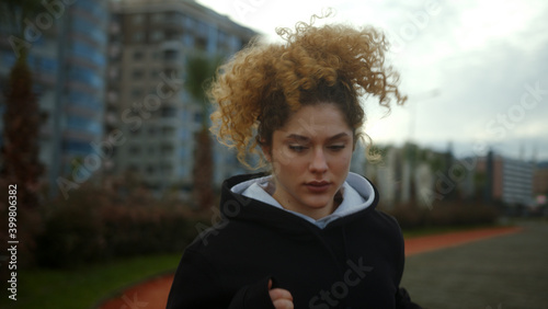 Fitness Workout Outdoors close-up. Healthy Young Woman Athlete Exercising Outside in Park