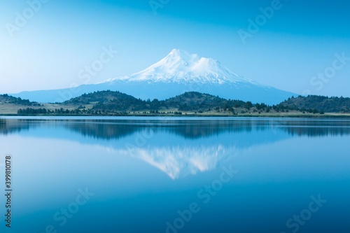 Beautiful Mount Shasta and Siskiyou Lake A reflection of snow capped Mount Shasta in a clear water in lake at sunrise in California State, USA. Siskiyou County