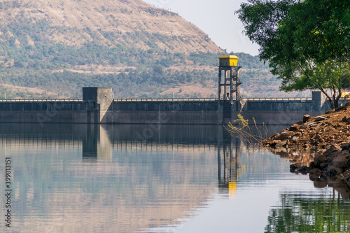 Panoramic view of Panshet dam wall with trees located in Pune, Maharashtra, India