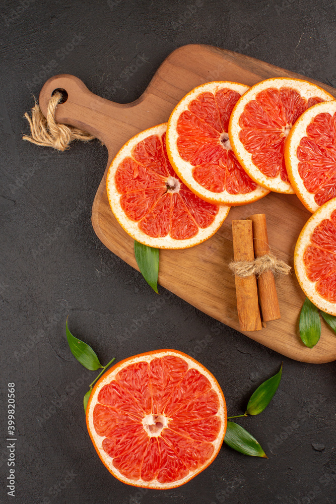 top view fresh grapefruit slices on the dark background fruit healthy life fresh color juice top view fresh grapefruit slices on the dark background fruit healthy life fresh color juice