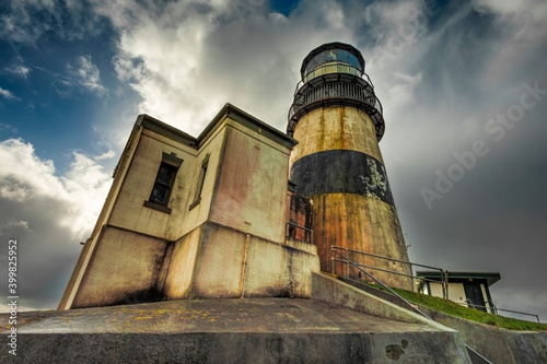 Cape Disappointment Lighthouse under dramatic skies photo