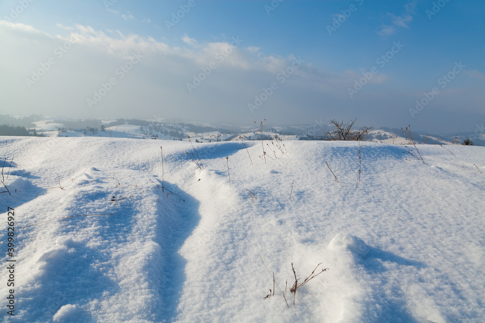 Deep snow on mountain slope, snowfall, Ukraine, Carpathians.