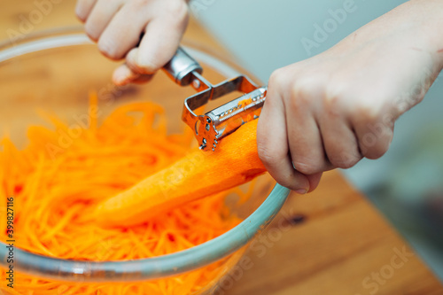 shredded carrots. slicing carrots container. korean carrot.carrot shredder