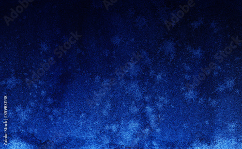 Abstract watercolor lightly gradient background of dark blue color with washed faded spots. Blurry night sky without stars. Hand drawn illustration on wet paper
