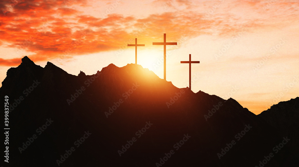 Crosss at sunset in mountains. Concept of Crucifixion of Jesus Christ.  