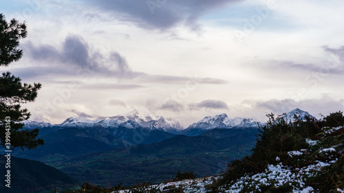 beautiful panoramic photograph of a mountainous landscape. peaks of europe. snowy mountain range.