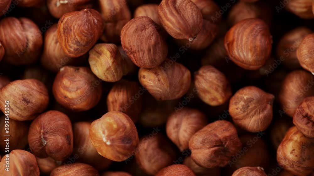 Super Slow Motion Detail Shot of Flying and Rotating Hazelnuts at 1000 fps. Super Slow Motion Detail Shot of Flying and Rotating Hazelnuts at 1000 fps.