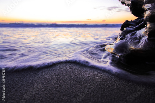 Onde e schiuma al tramonto  photo