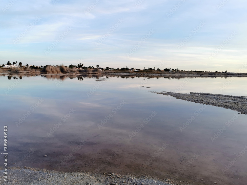 Beautiful Salt Lake in Spain on the sunset the silhouette of the earth on the horizon Beautiful Salt Lake in Spain on the sunset the silhouette of the earth on the horizon