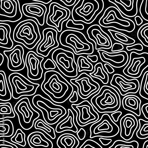 White chaotic shapes on black background. Seamless abstract doodle pattern. Suitable for packaging, textile.