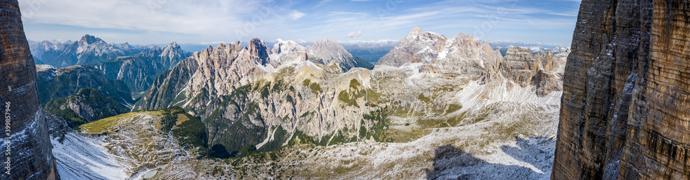 panorama view through the mountains of tre cime di lavaredo on the mountains of alps 