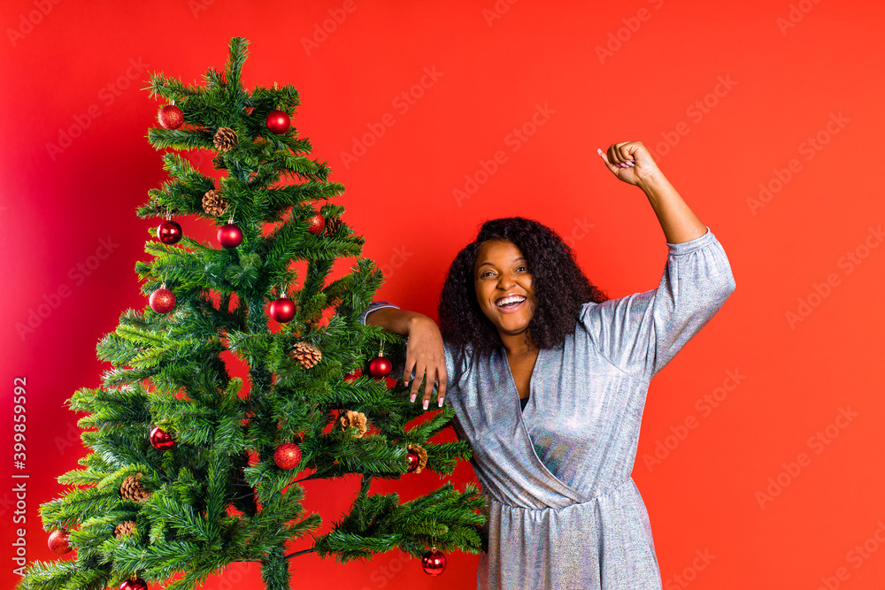 afro spanish woman celebration christmas in silver dress afro spanish woman celebration christmas in silver dress