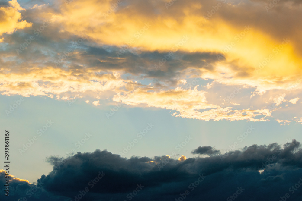 glowing clouds on evening sky. beautiful nature background
