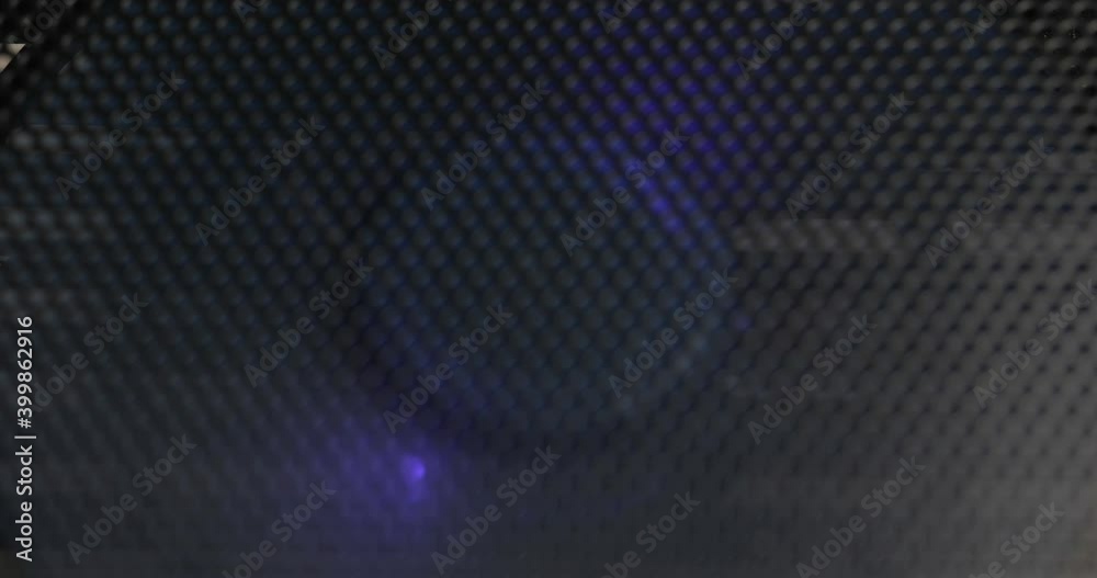 Computer cooler with blue LED light. Fan inside the computer Computer cooler with blue LED light. Fan inside the computer
