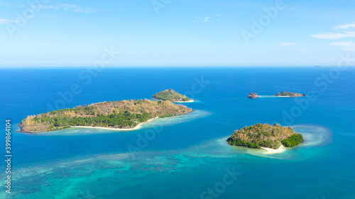Aerial drone of group of Tropical Islands with beaches on the Zamboanga Peninsula. Sallangan Islands, Simoadang Island. Mindanao, Philippines.
